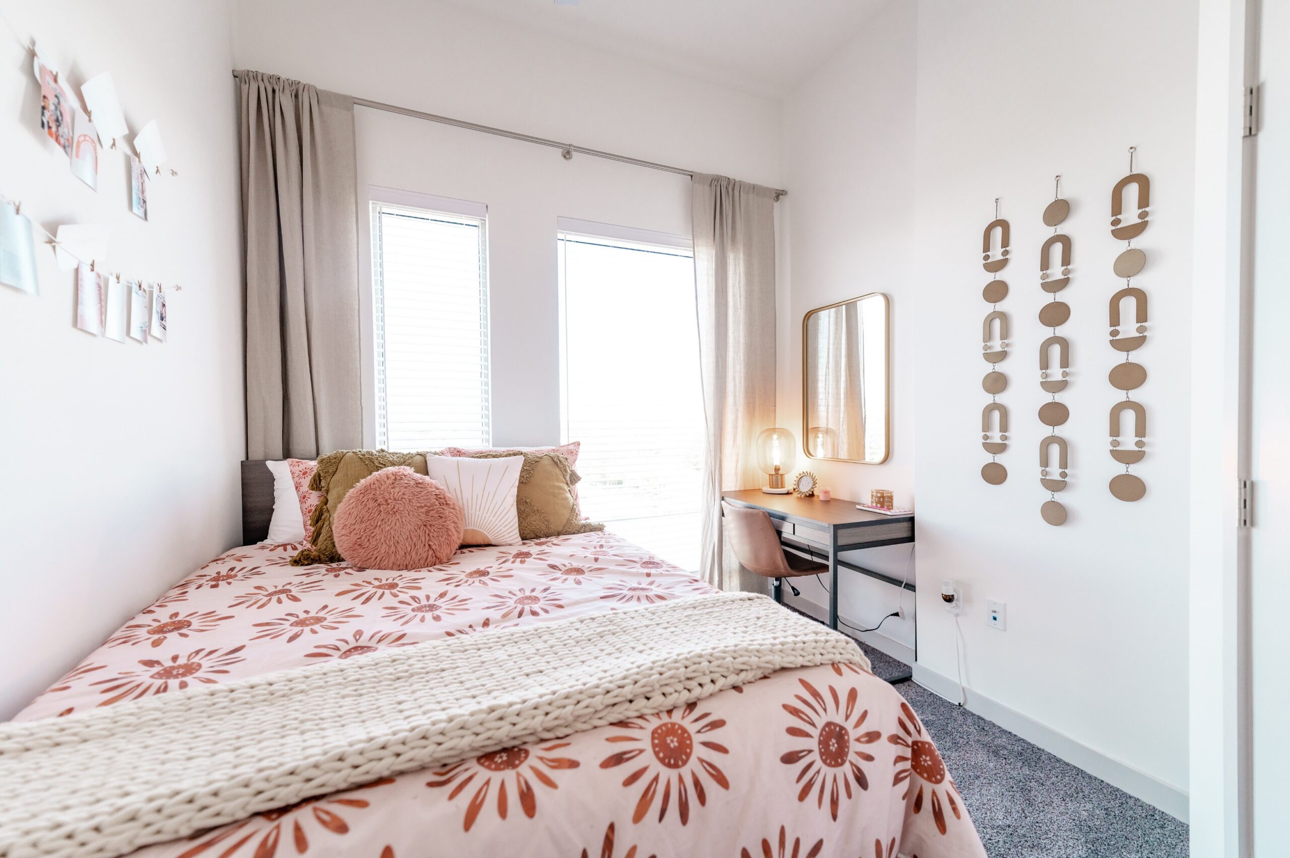 apartment bedroom floral bedding desk scaled