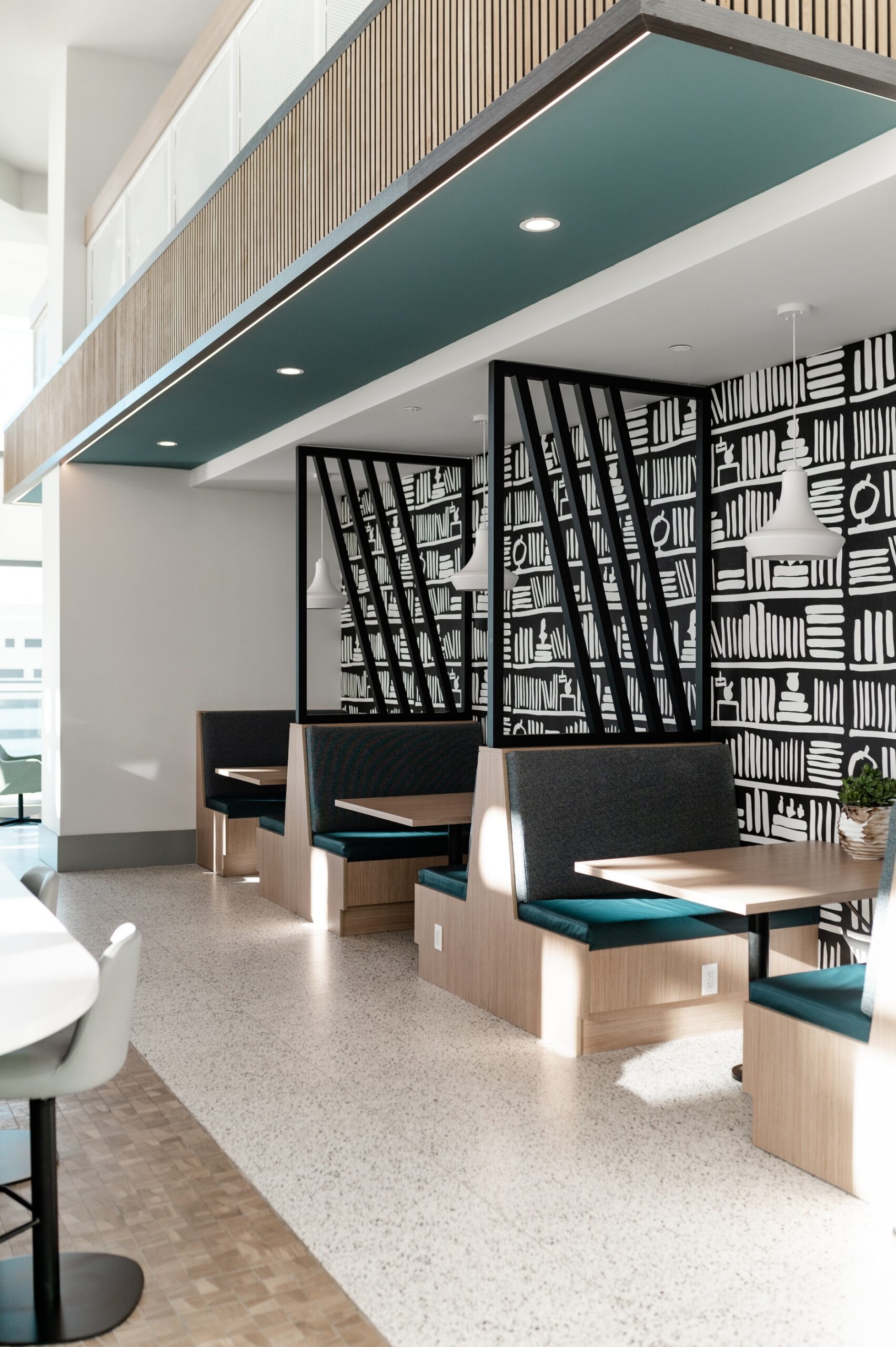 apartment coworking study booths bookshelf wallpaper scaled